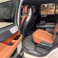 Clean orange and black truck interior after detailing